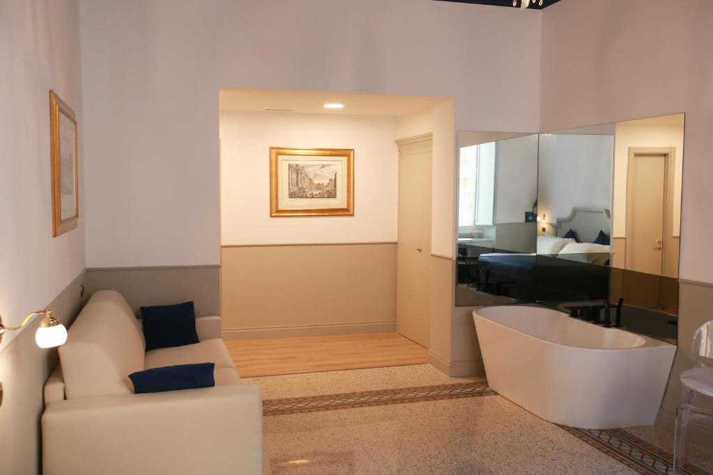 A seating area at Duelle Vatican Suite