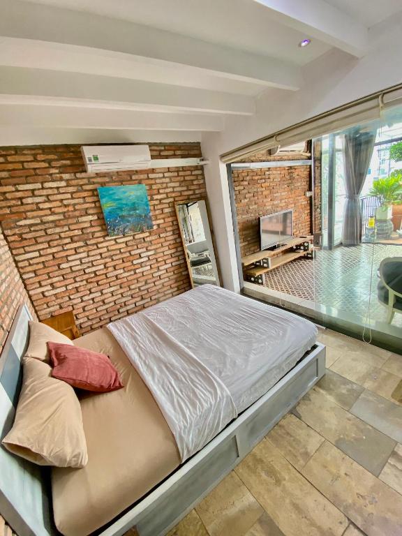 Postel nebo postele na pokoji v ubytování The Palmian City Center Serviced Apartment