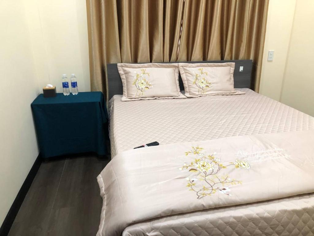 Giường trong phòng chung tại Dory Homestay
