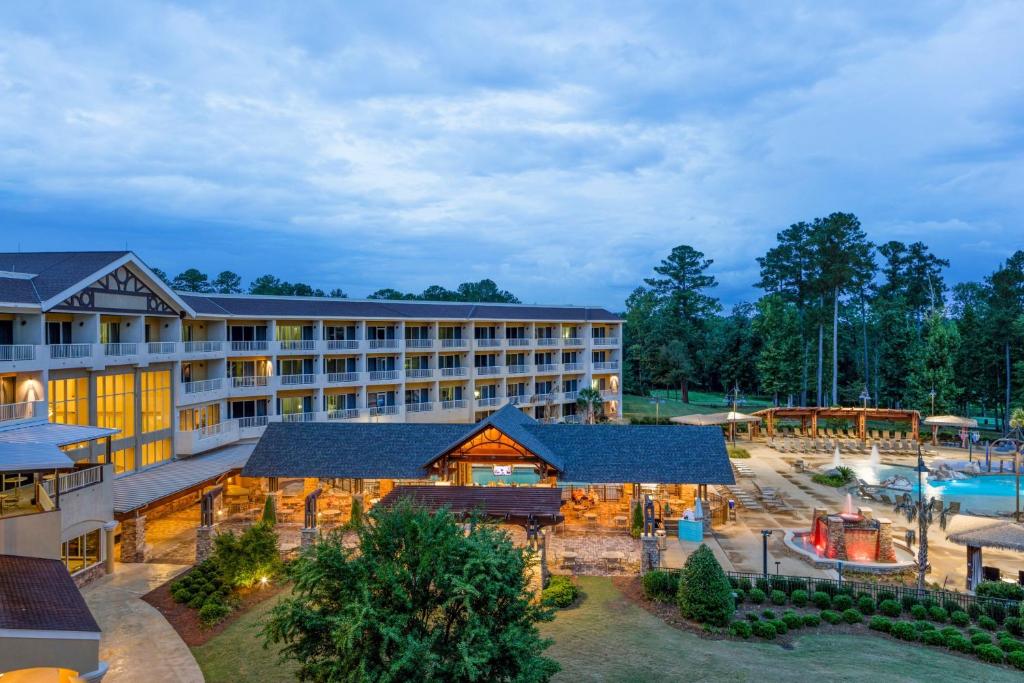 an aerial view of a resort with a pool at Auburn Marriott Opelika Resort & Spa at Grand National in Opelika