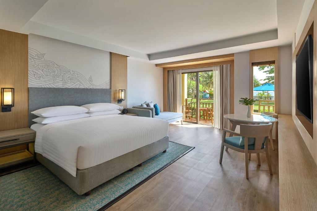 Postel nebo postele na pokoji v ubytování Phuket Marriott Resort & Spa, Merlin Beach