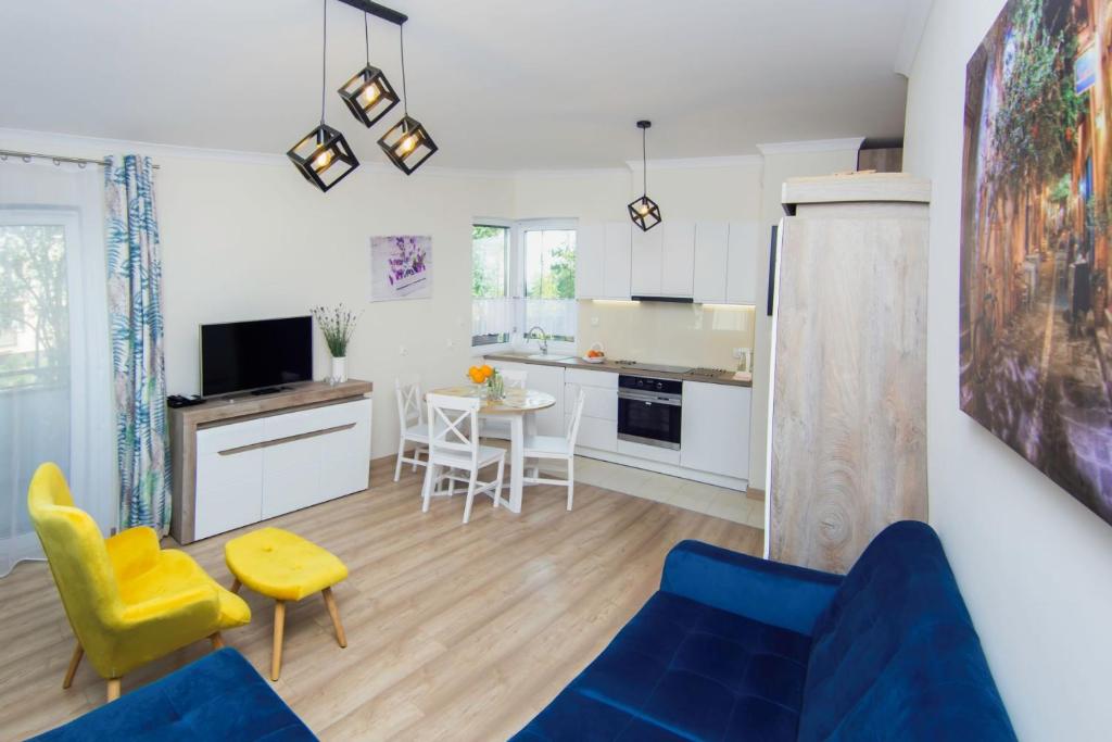 Kuchyň nebo kuchyňský kout v ubytování Apartament A1 MODERNO Parking