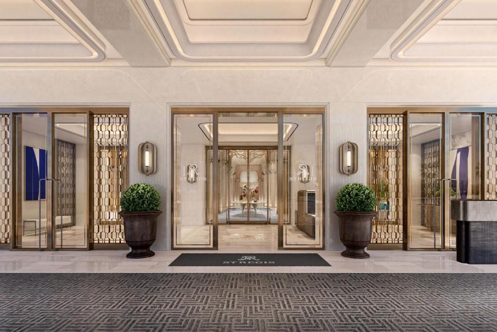 a rendering of a lobby with glass doors and plants at The St. Regis Kuwait in Kuwait