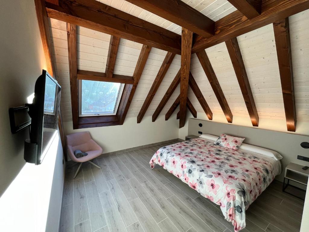 Postel nebo postele na pokoji v ubytování HOTEL RURAL BASQUE IRATI