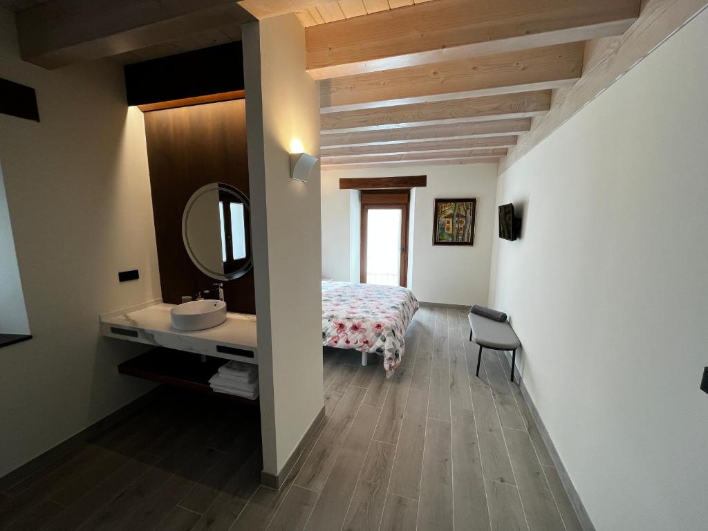 Postel nebo postele na pokoji v ubytování HOTEL RURAL BASQUE IRATI