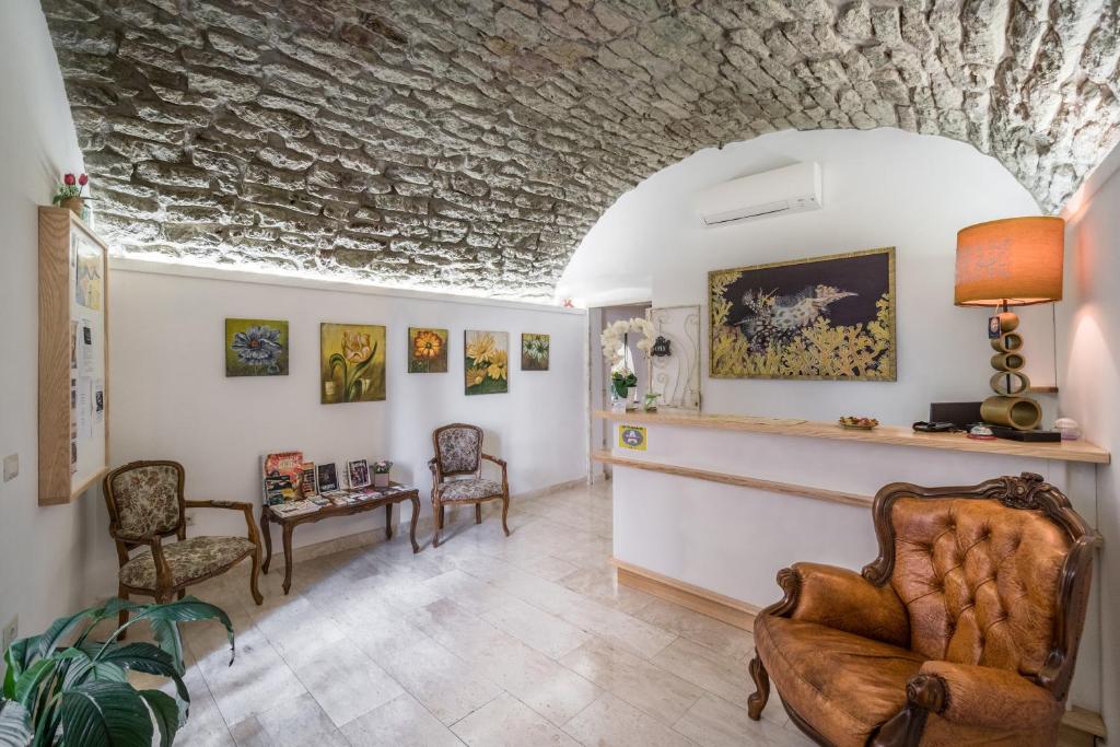 Posezení v ubytování Bosa Queen House