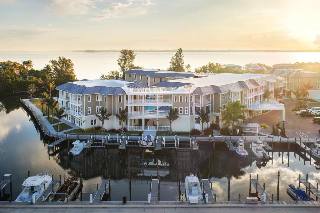 an aerial view of a resort with a marina at Waterline Villas & Marina, Autograph Collection in Holmes Beach