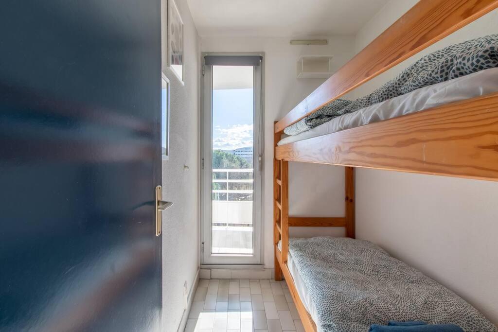 Posteľ alebo postele v izbe v ubytovaní Les Jardins du Couchant * Proche Mer * Climatisation * parking privé
