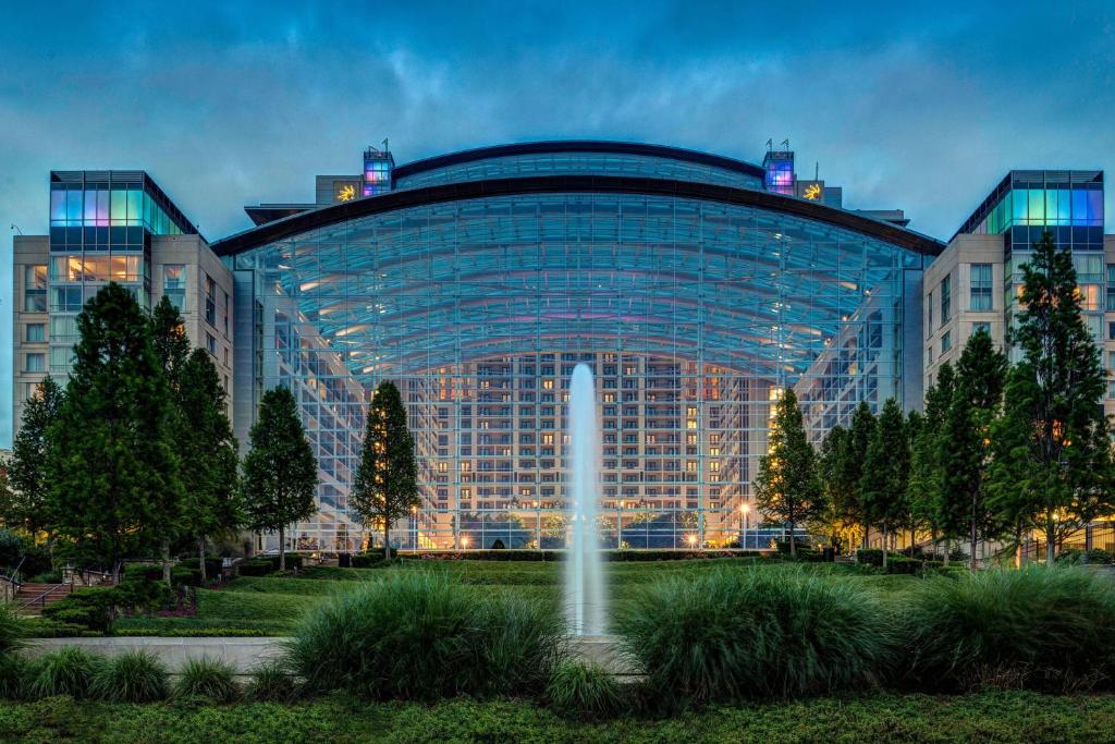 a large building with a fountain in front of it at Gaylord National Resort & Convention Center in National Harbor