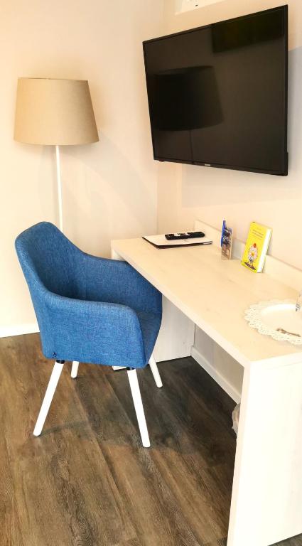 TV a/nebo společenská místnost v ubytování Hotel Gutsmühle