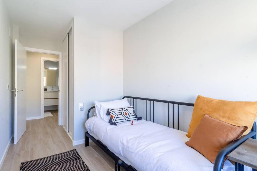 A bed or beds in a room at Moderno, Castro, Corazón de Vigo