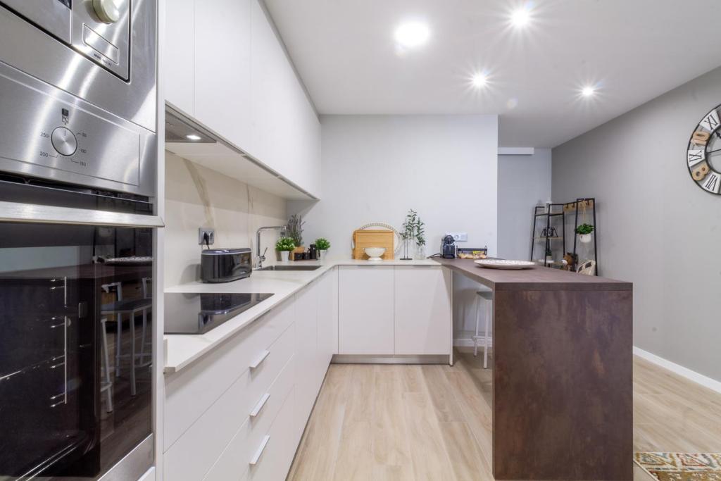 A kitchen or kitchenette at Moderno, Castro, Corazón de Vigo
