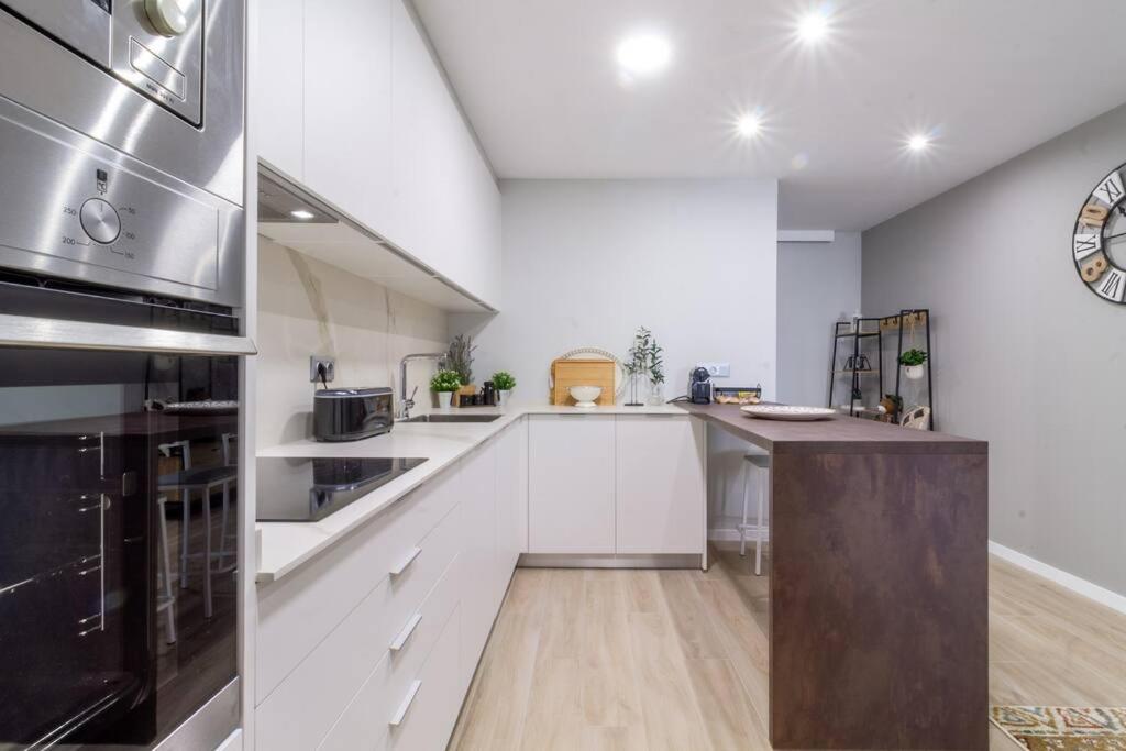 A kitchen or kitchenette at Moderno, Castro, Corazón de Vigo