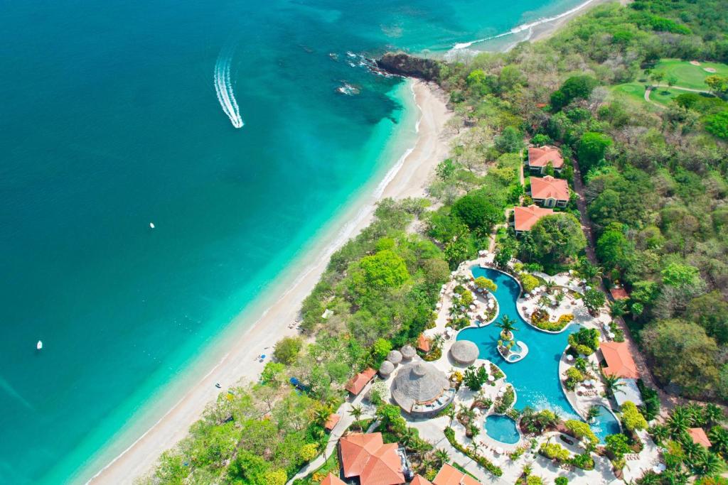 an aerial view of the resort and the beach at The Westin Reserva Conchal, an All-Inclusive Golf Resort & Spa in Playa Conchal