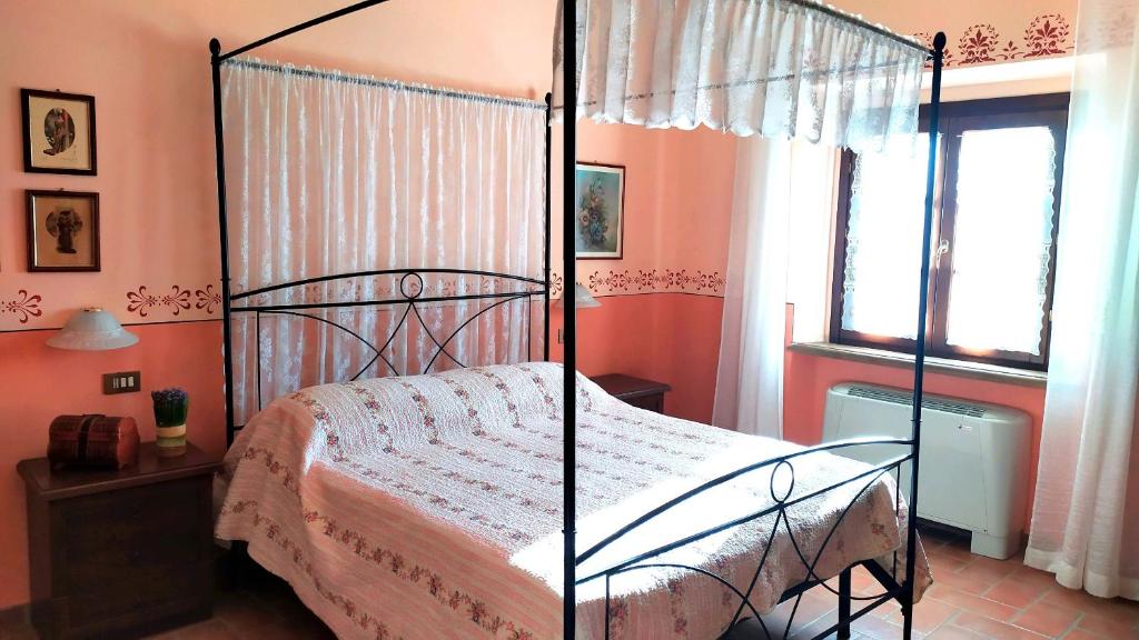 Postel nebo postele na pokoji v ubytování agriturismo macchia al pino