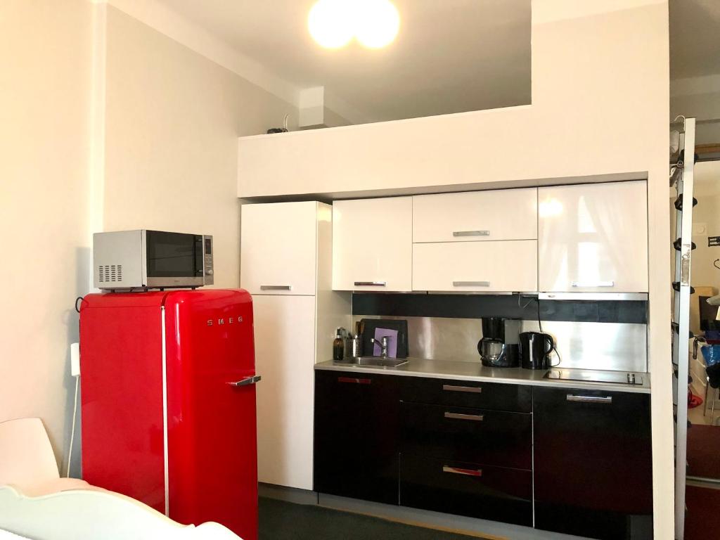Kuchyň nebo kuchyňský kout v ubytování Sweet home 40 City Center Punavuori