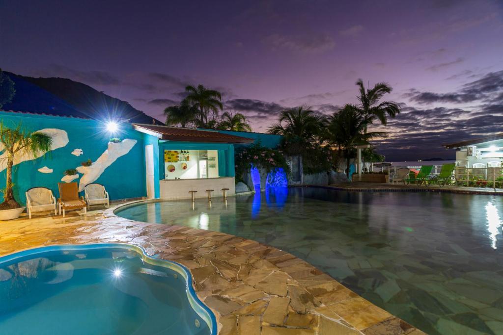 A piscina localizada em Pousada Daleste ou nos arredores