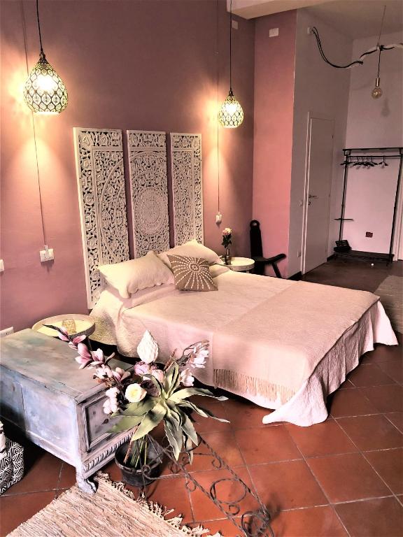 Posteľ alebo postele v izbe v ubytovaní White & Gold Suite Verona