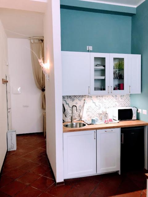 Kuchyňa alebo kuchynka v ubytovaní White & Gold Suite Verona