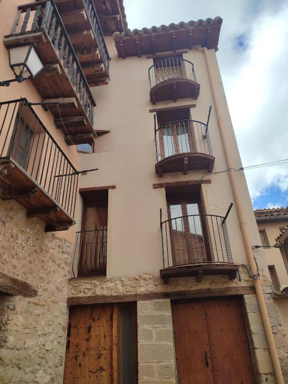 a building with balconies on the side of it at CASA CARRANCLANC in Peñarroya de Tastavins