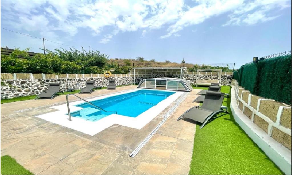 Bazén v ubytování Casa Rural Finca Paraíso. Heated pool nebo v jeho okolí