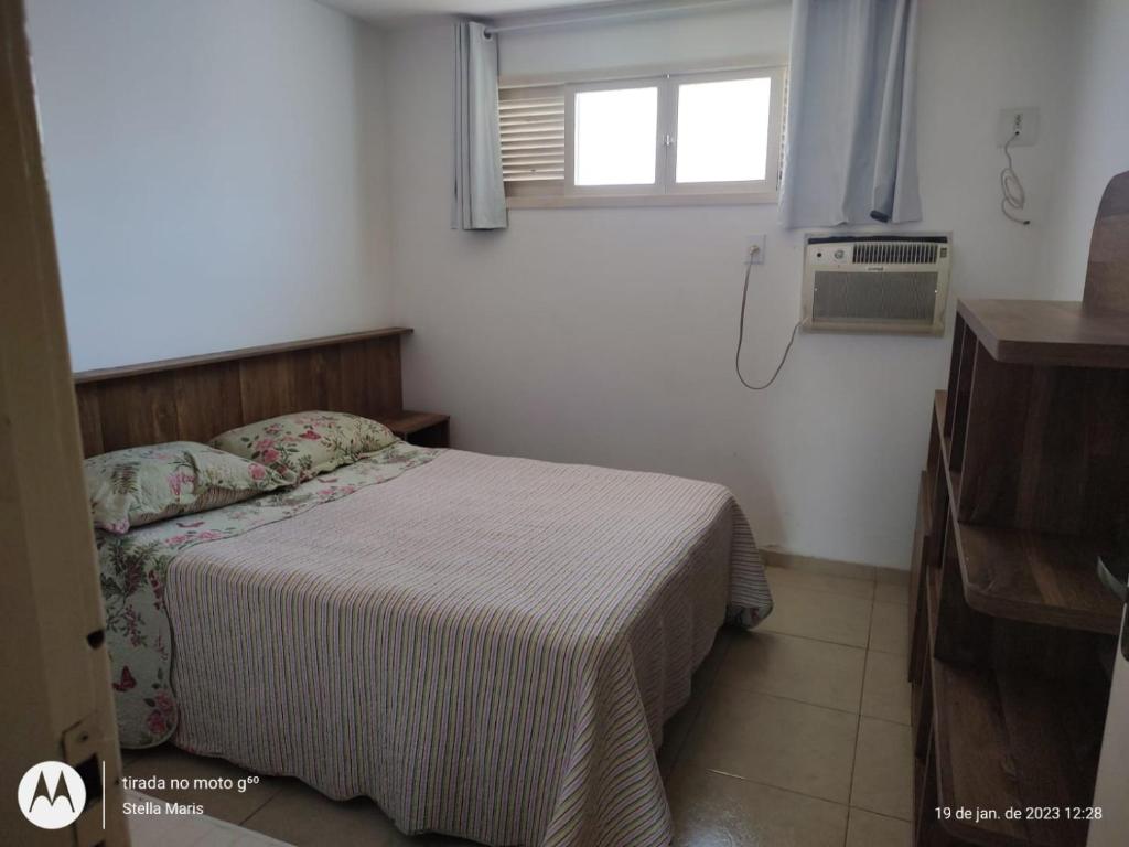 Ліжко або ліжка в номері Apartamento Portinho