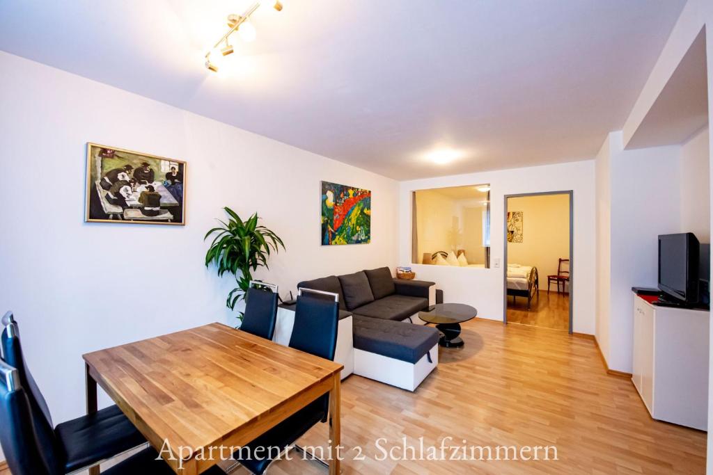 TV a/nebo společenská místnost v ubytování Astoria Apartments
