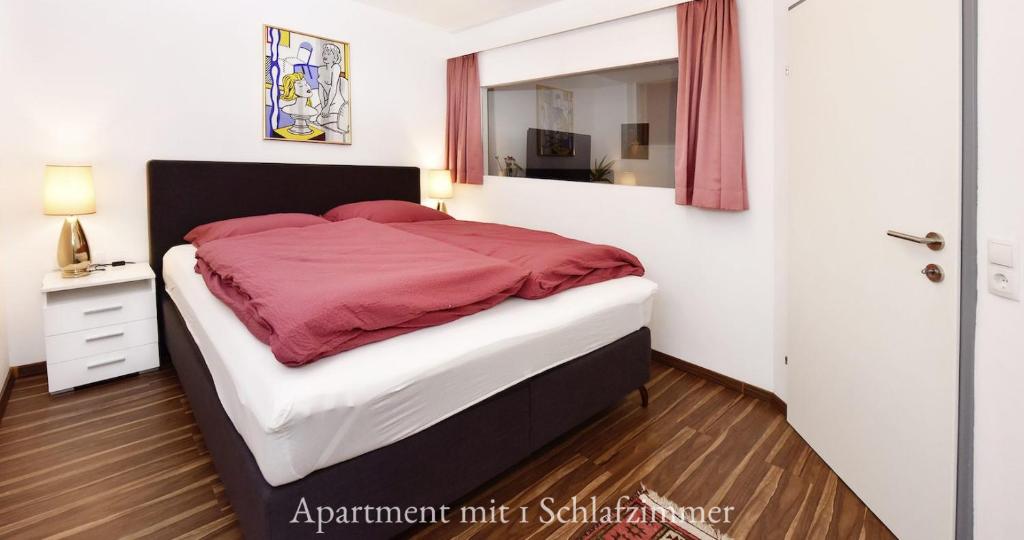 Postel nebo postele na pokoji v ubytování Astoria Apartments