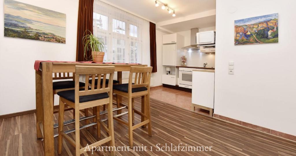 Kuchyň nebo kuchyňský kout v ubytování Astoria Apartments