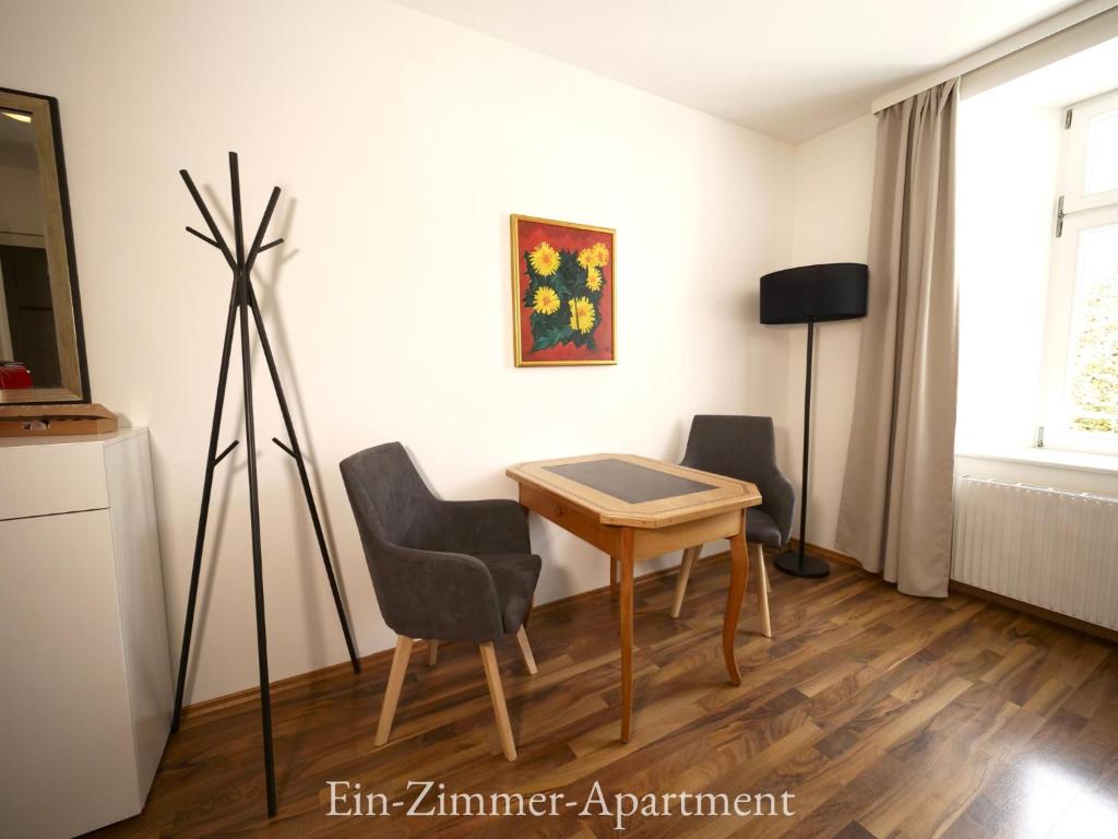 TV a/nebo společenská místnost v ubytování Astoria Apartments