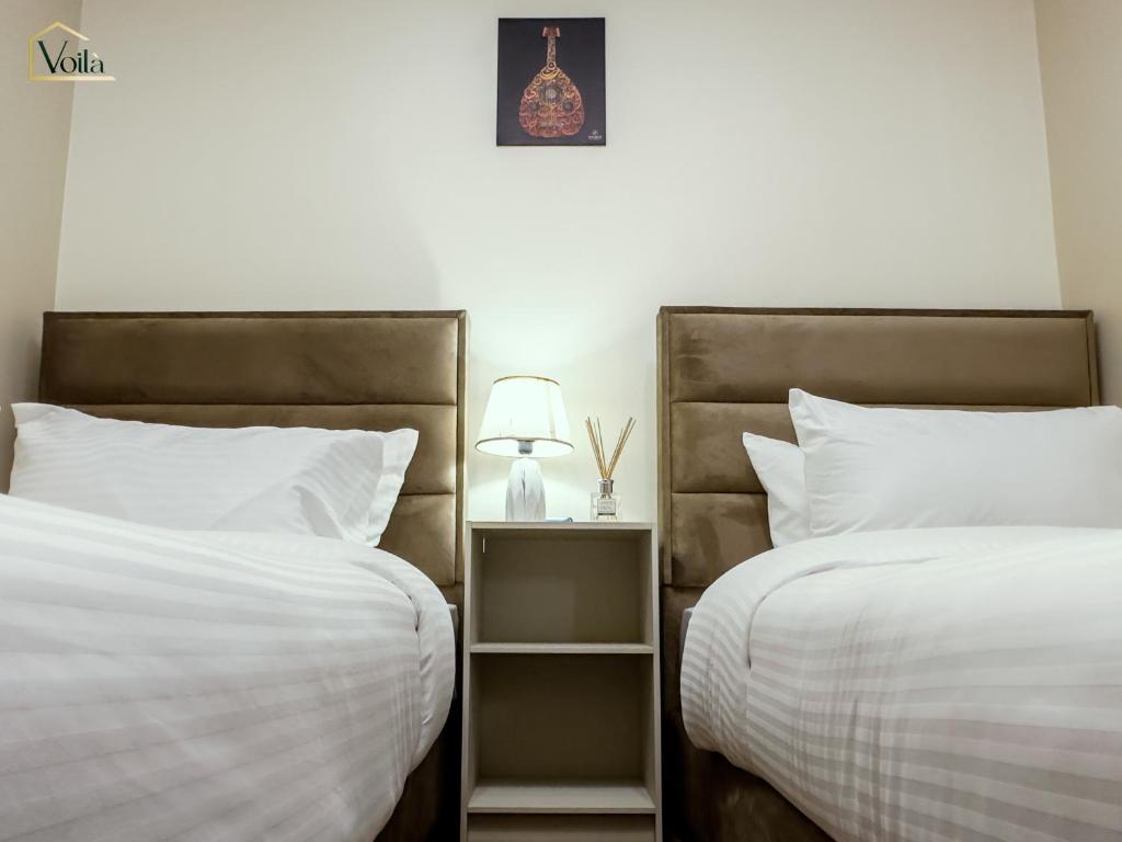 Postel nebo postele na pokoji v ubytování Petra Voila
