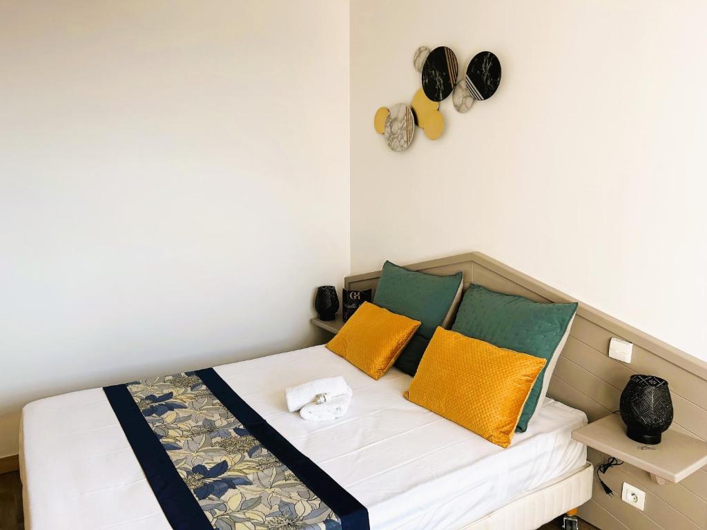 Postel nebo postele na pokoji v ubytování Gabrielle hôtel