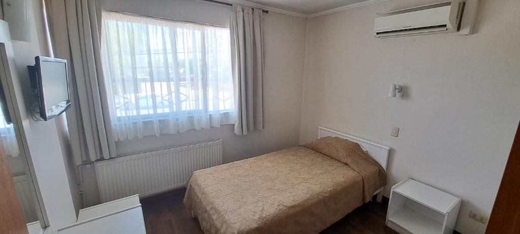 Postel nebo postele na pokoji v ubytování Hotel Los Andes