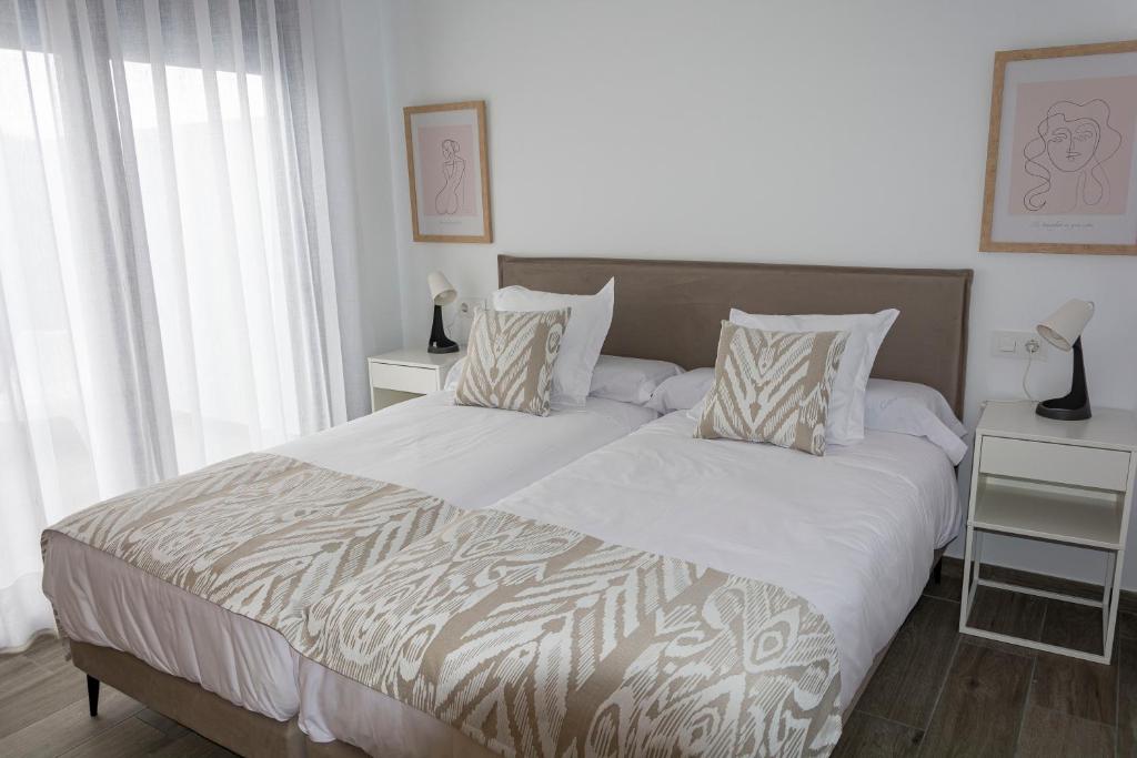 Posteľ alebo postele v izbe v ubytovaní Apartamentos El Mirador de la Janda