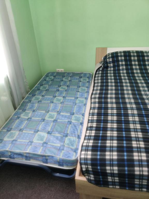 Postel nebo postele na pokoji v ubytování Vitajte v Ivachnovej 145