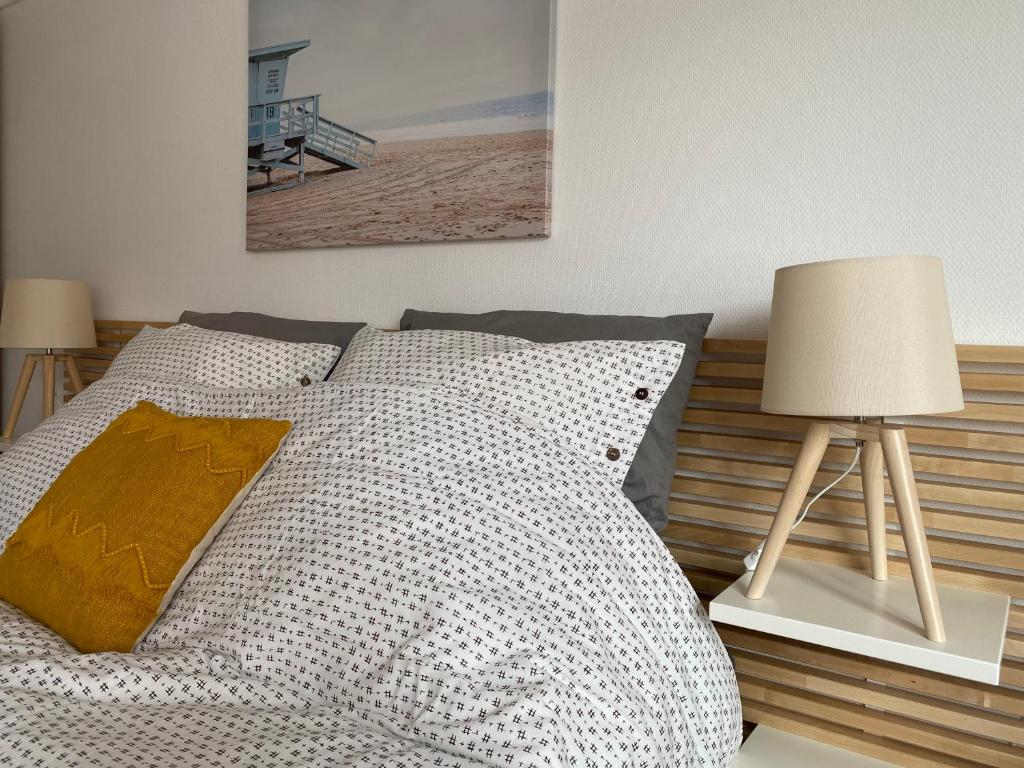 Posteľ alebo postele v izbe v ubytovaní Chez Mathilde Appartement Calais Nord Citadelle