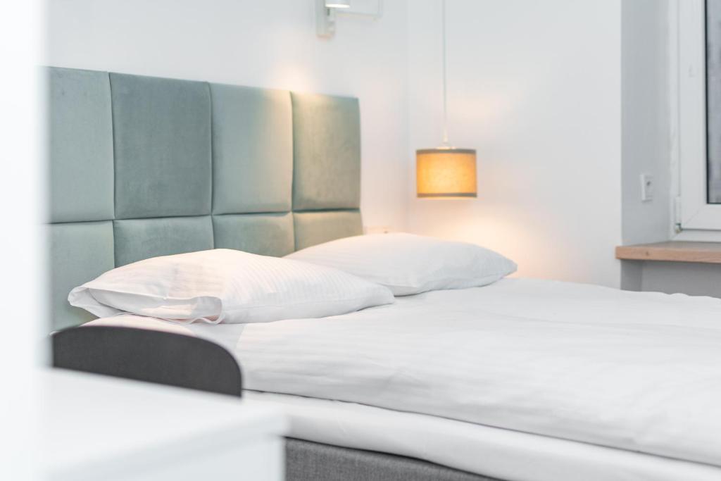 Posteľ alebo postele v izbe v ubytovaní Apartament Plac Konstytucji by Your Freedom
