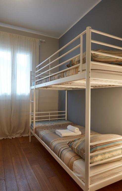 Postel nebo postele na pokoji v ubytování Ca' Viridi