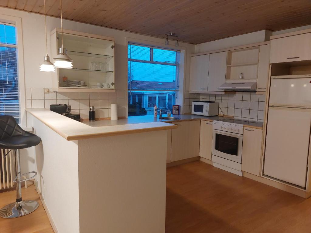 Kuchyň nebo kuchyňský kout v ubytování Venos rooms