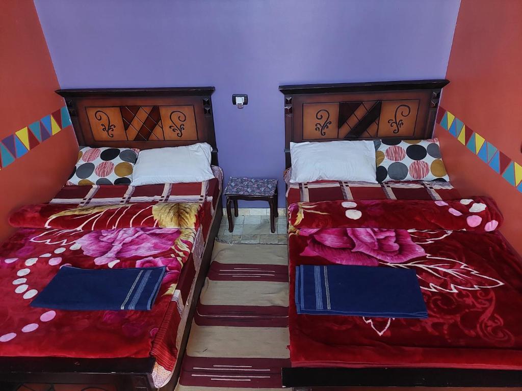 Postel nebo postele na pokoji v ubytování Mostafa guesthouse