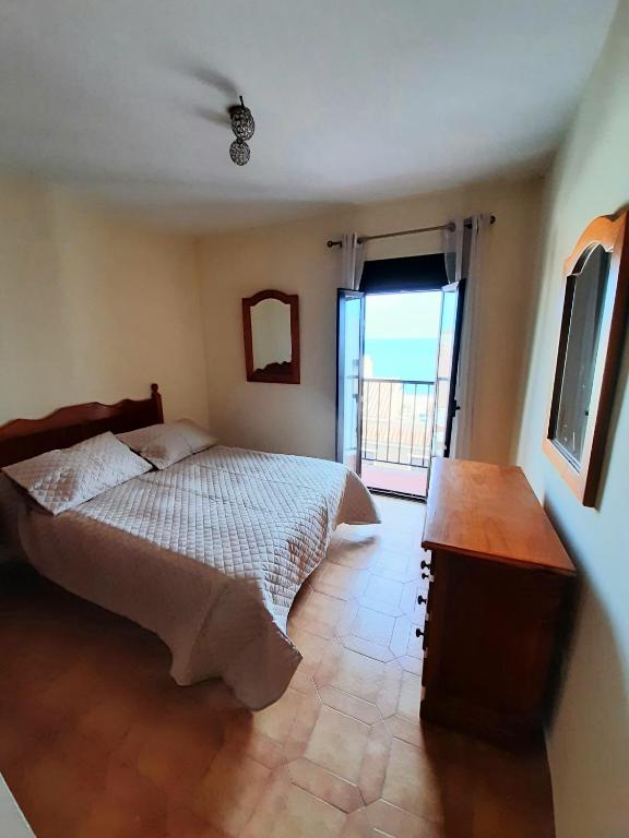 Postel nebo postele na pokoji v ubytování Beachfront Penthouse 3 double bedrooms, 2 bathrooms
