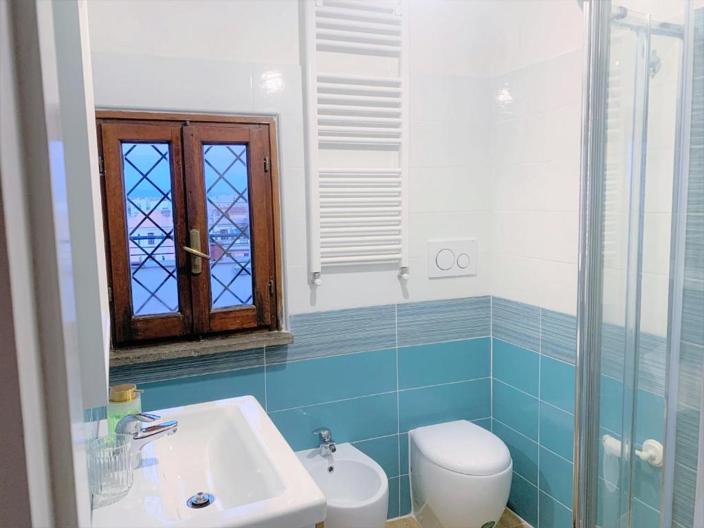 A bathroom at In the Clouds over Trastevere, penthouse studio