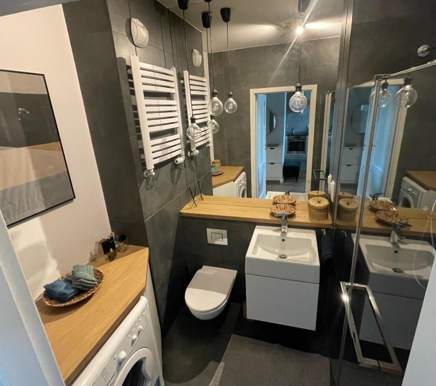 Kúpeľňa v ubytovaní Royal Park Łazienki - Terrace Boutique Apartment