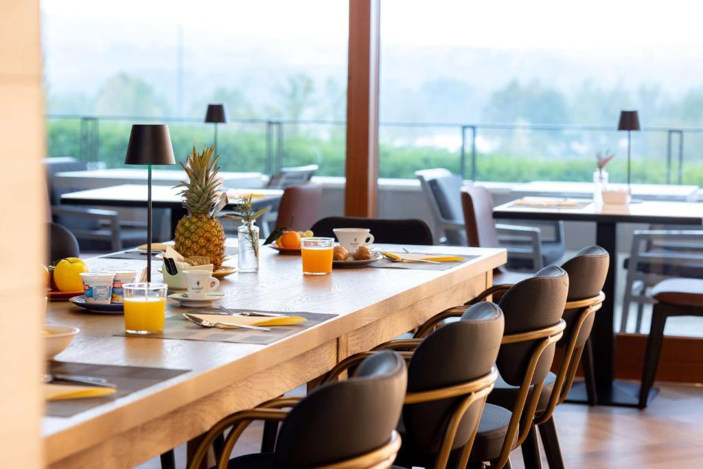 Restauracja lub miejsce do jedzenia w obiekcie Hotel Horizon Wellness & Spa Resort - Best Western Signature Collection