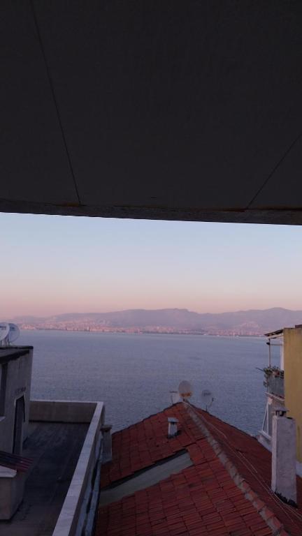 a view of a large body of water from a building at Güneş in Konak