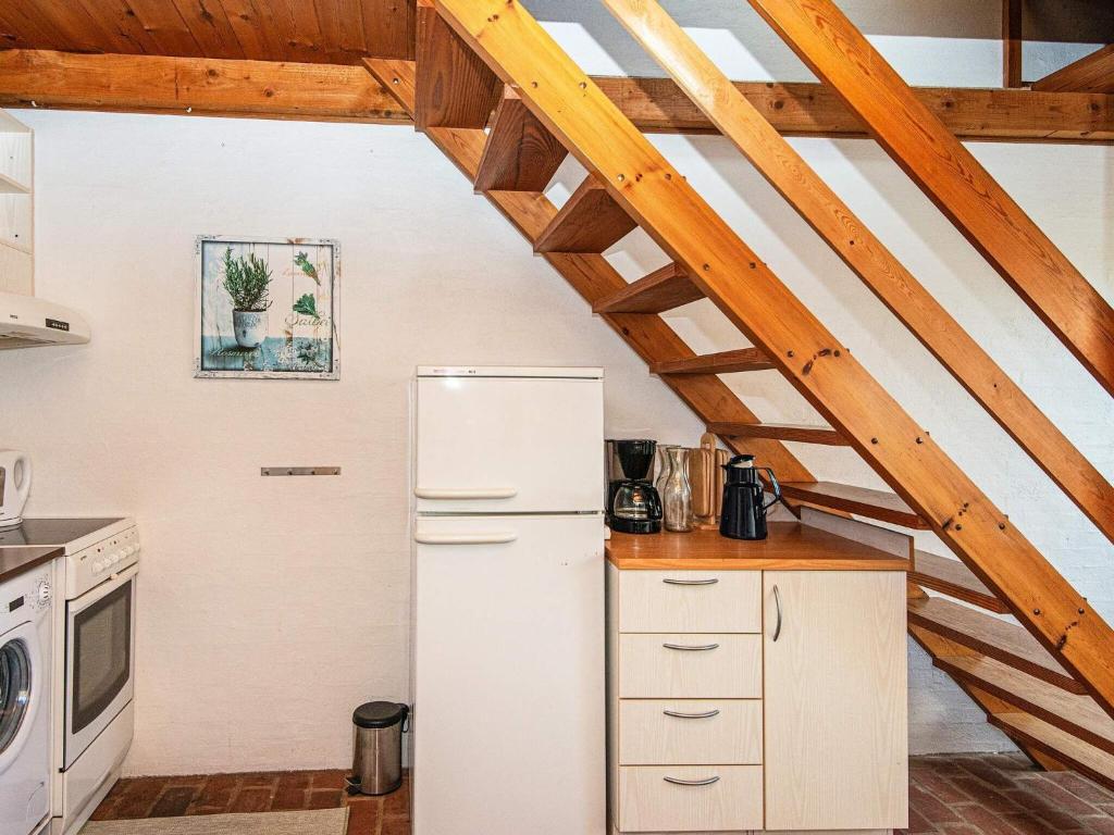 Kuchyň nebo kuchyňský kout v ubytování Holiday home Rømø CXXV