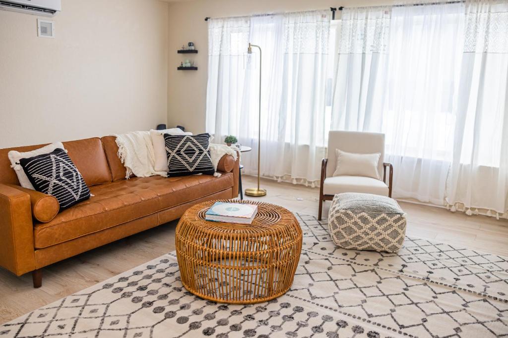 a living room with a couch and a table at The 07 Oasis in Fort Wayne