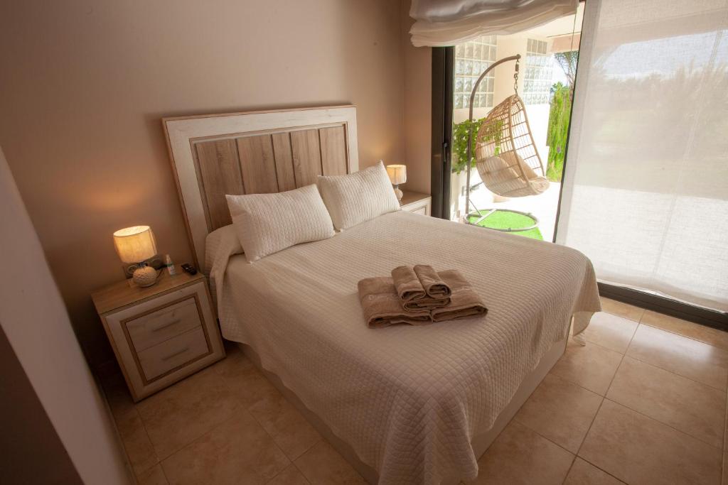 Posteľ alebo postele v izbe v ubytovaní Destino Deluxe Valle del Este Vera