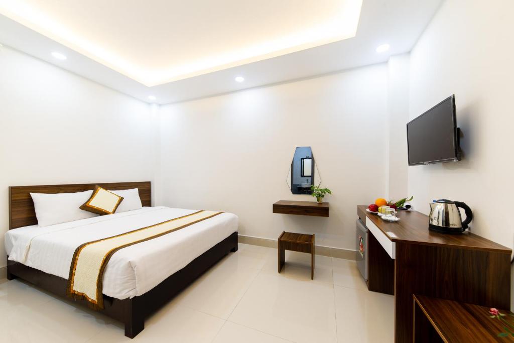 Giường trong phòng chung tại Đà Lạt Cao Nguyên Hotel