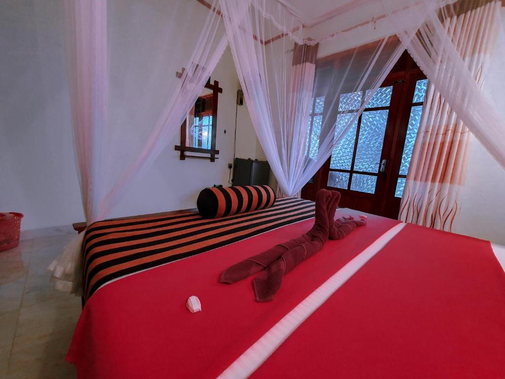 Postel nebo postele na pokoji v ubytování Serene Homestay Ella